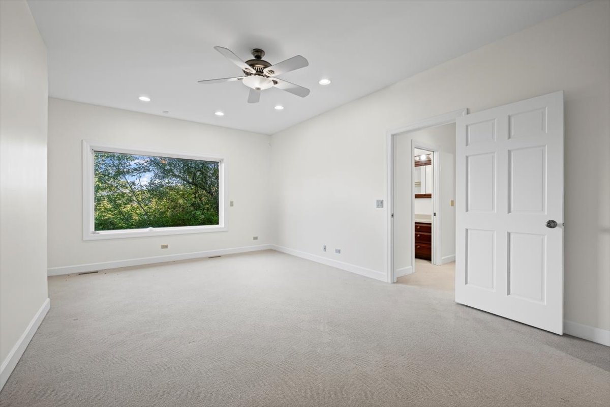 7510 East Tryon Grove Road Richmond, IL 60071 - Photo 27 of 63 a view of an empty room with a window