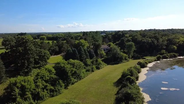 a view of a street with a garden