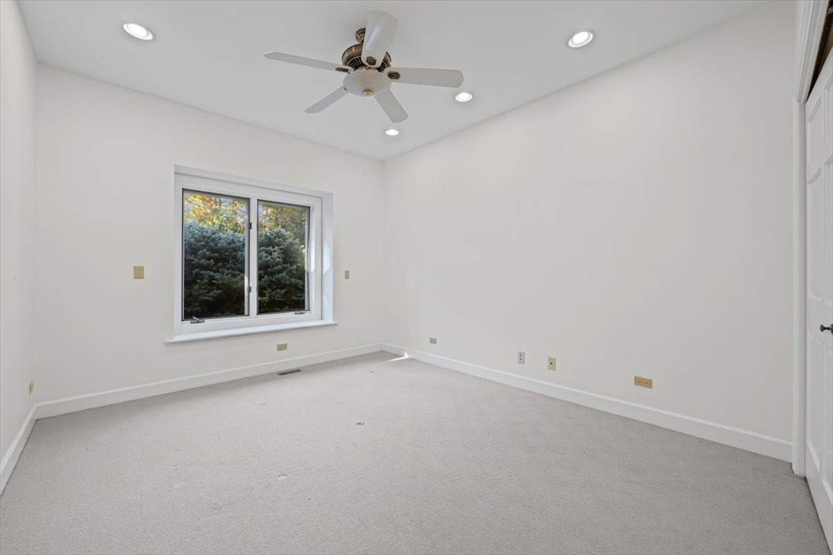 7510 East Tryon Grove Road Richmond, IL 60071 - Photo 33 of 63 an empty room with a window