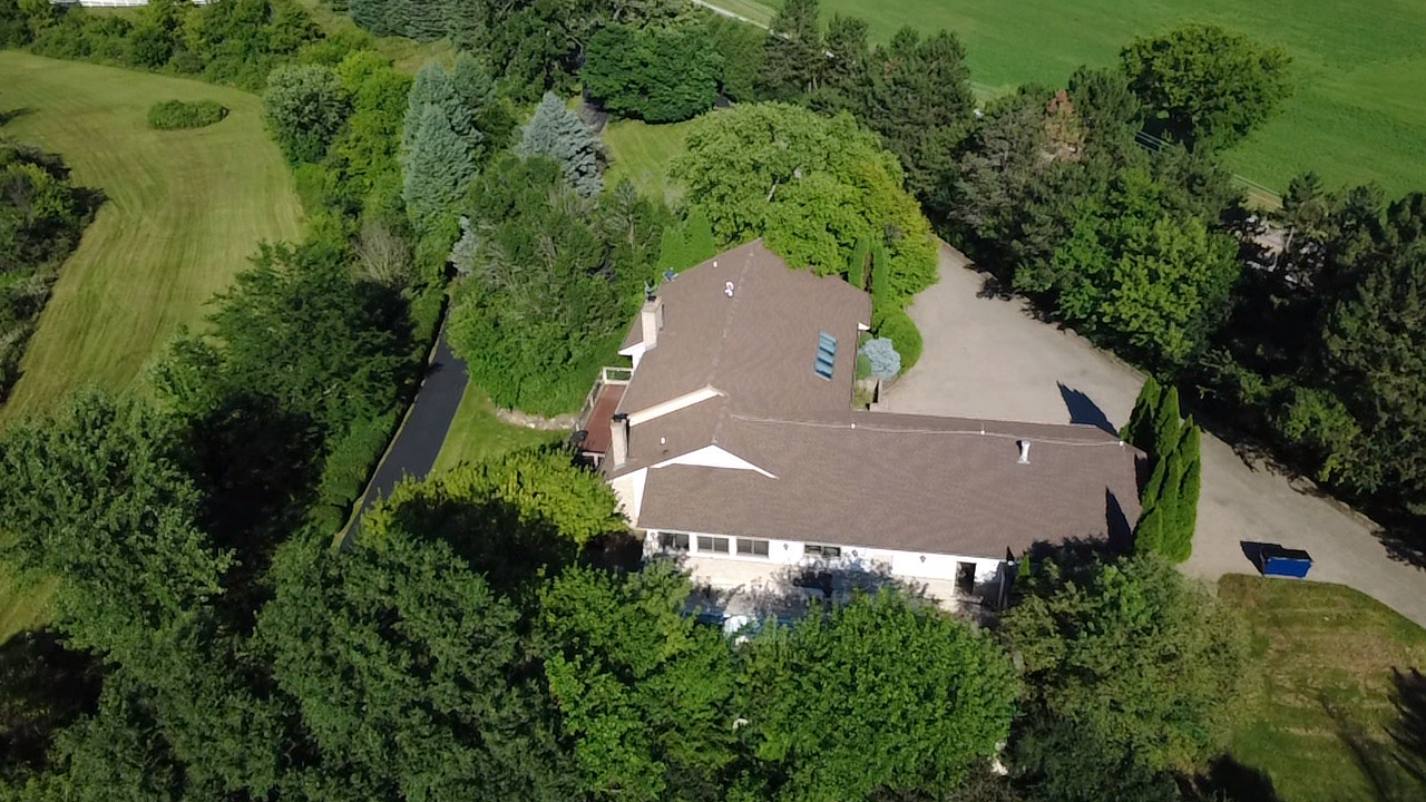 7510 East Tryon Grove Road Richmond, IL 60071 - Photo 51 of 63 an aerial view of residential house with outdoor space and trees all around