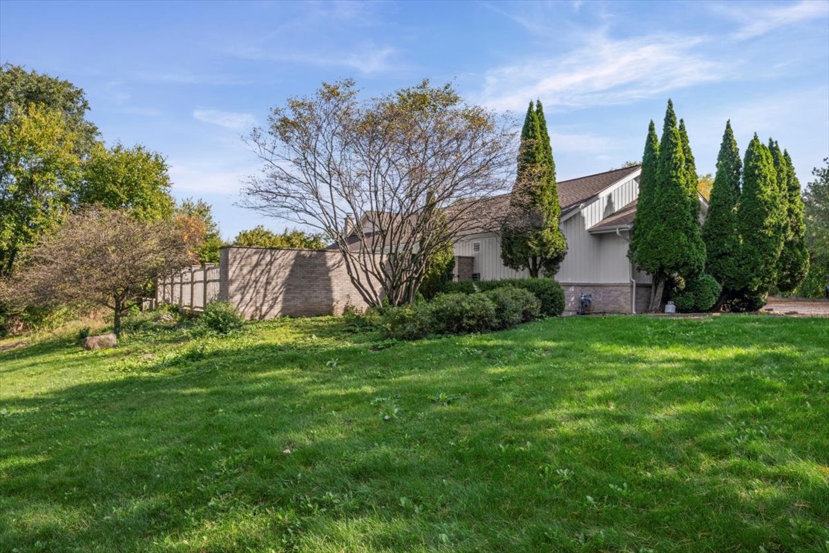 7510 East Tryon Grove Road Richmond, IL 60071 - Photo 8 of 63 a backyard of a house with lots of green space