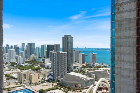 a view of a city with tall buildings