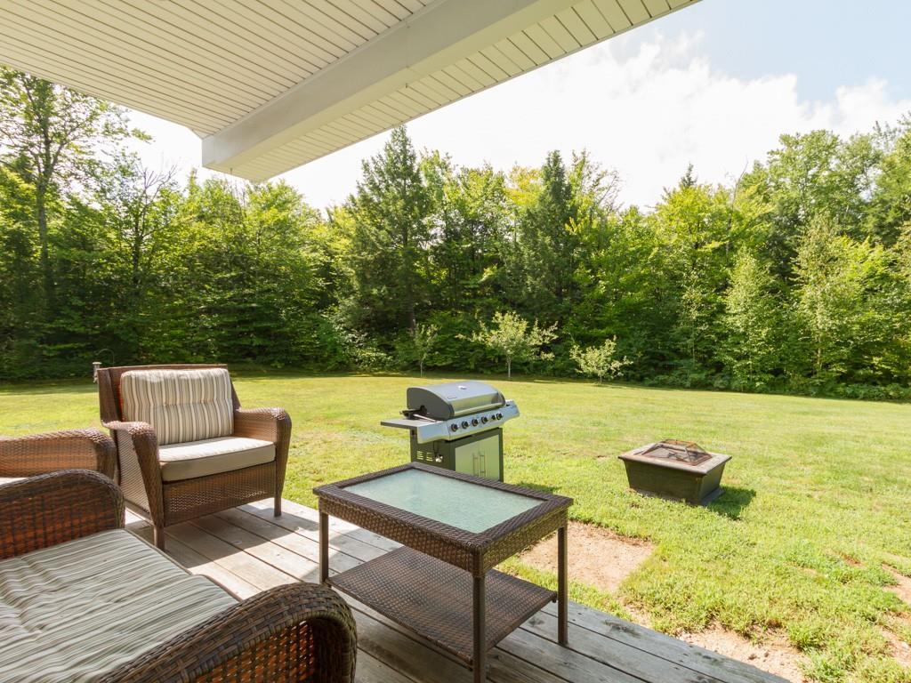 474 Hancock Pond Road Sebago, ME 04029 - Photo 25 of 33 Outside there is a covered deck...
