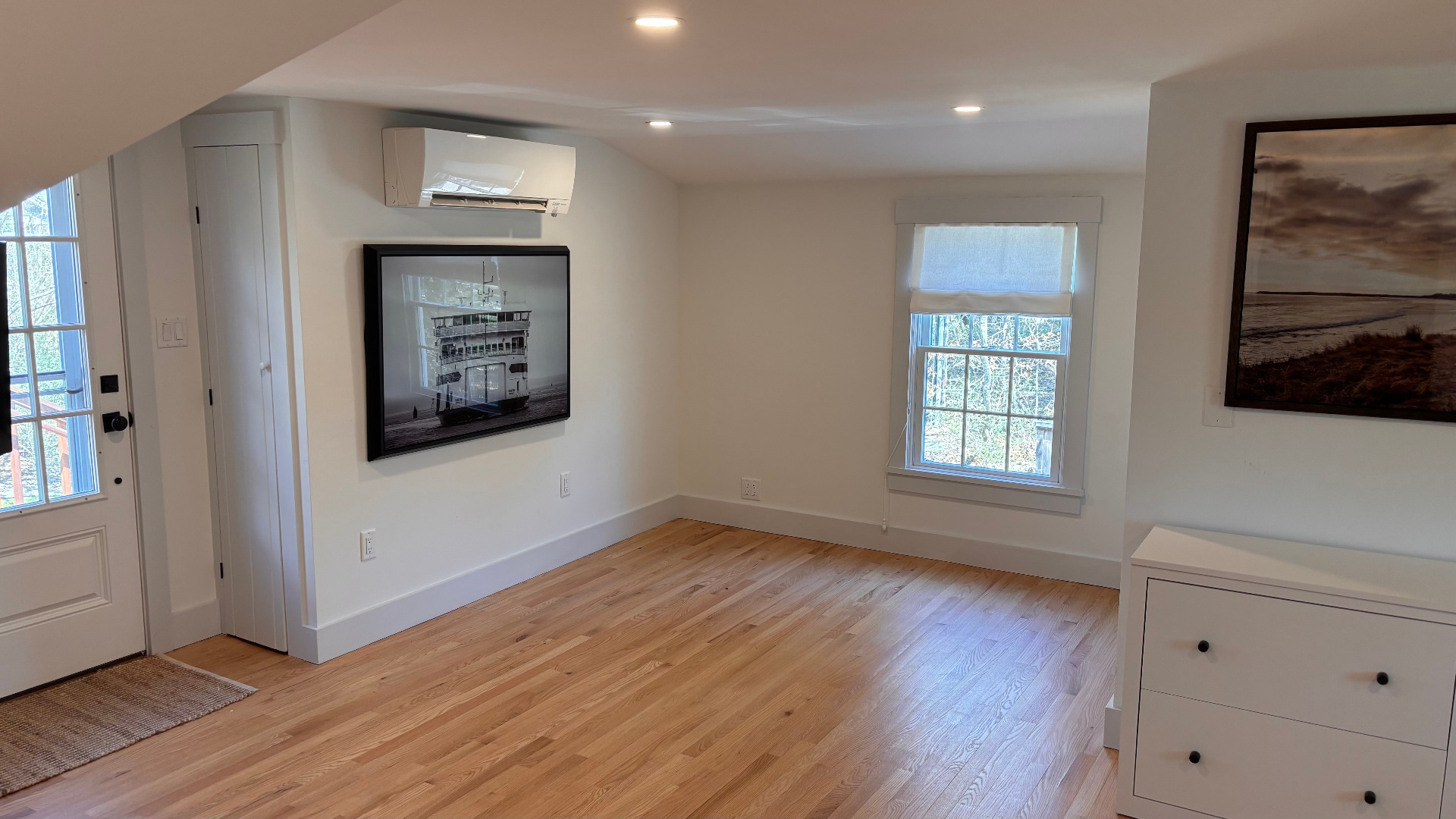 31 North Street Edgartown, MA 02539 - Photo 46 of 49 a view of an empty room with wooden floor and a window