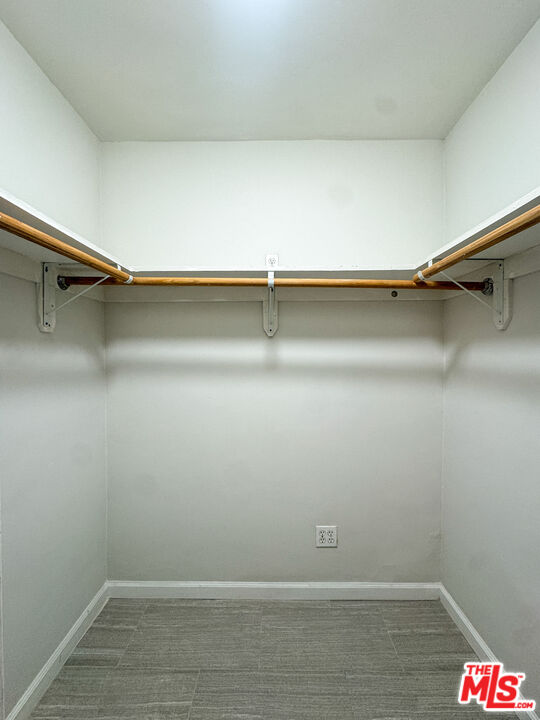 1323 South Ridgeley Drive, Unit 2 Los Angeles, CA 90019 - Photo 5 of 11 a close up view of racks on the wall