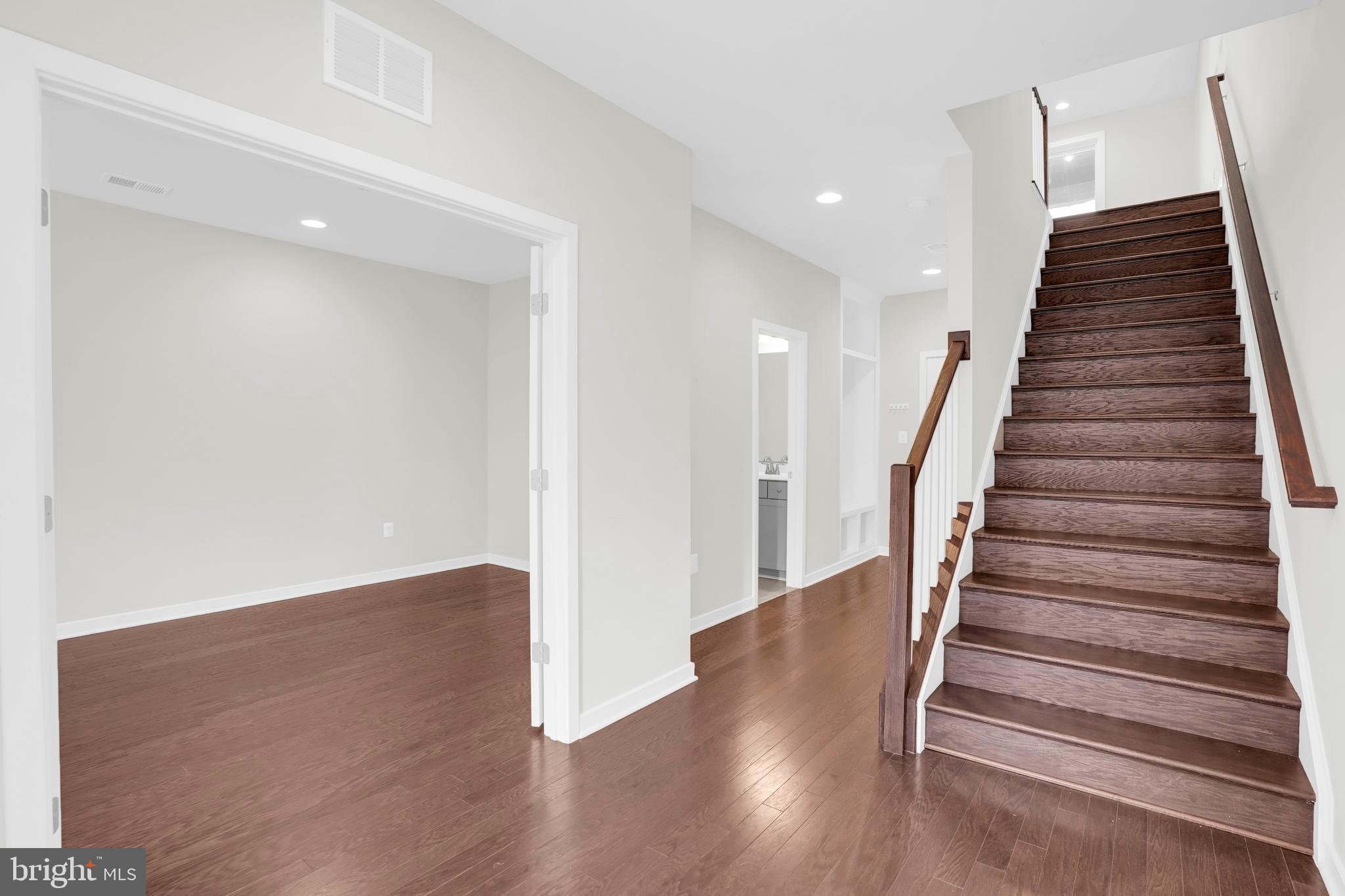 22954 Sullivans Cove Square Brambleton, VA 20148 - Photo 2 of 38 a view of entryway with wooden floor