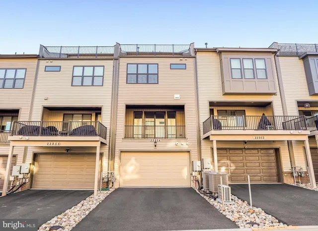 a front view of a building with many windows