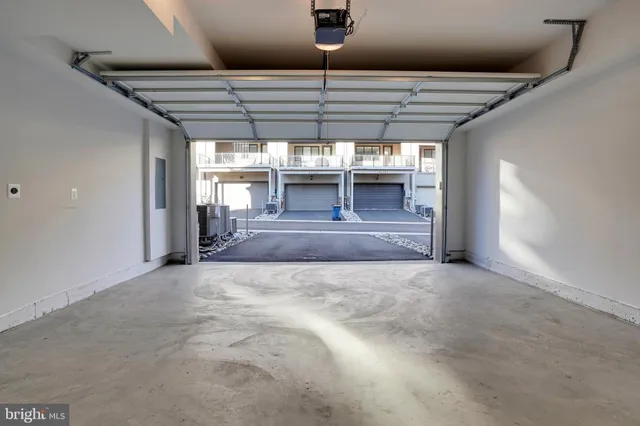 a view of large room with a ceiling fan