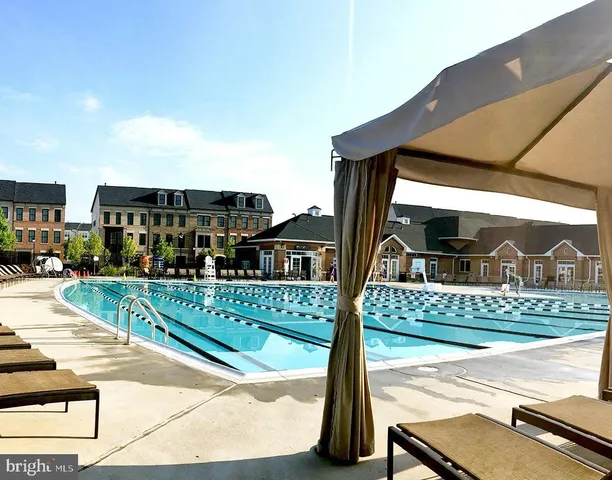a view of houses with a street