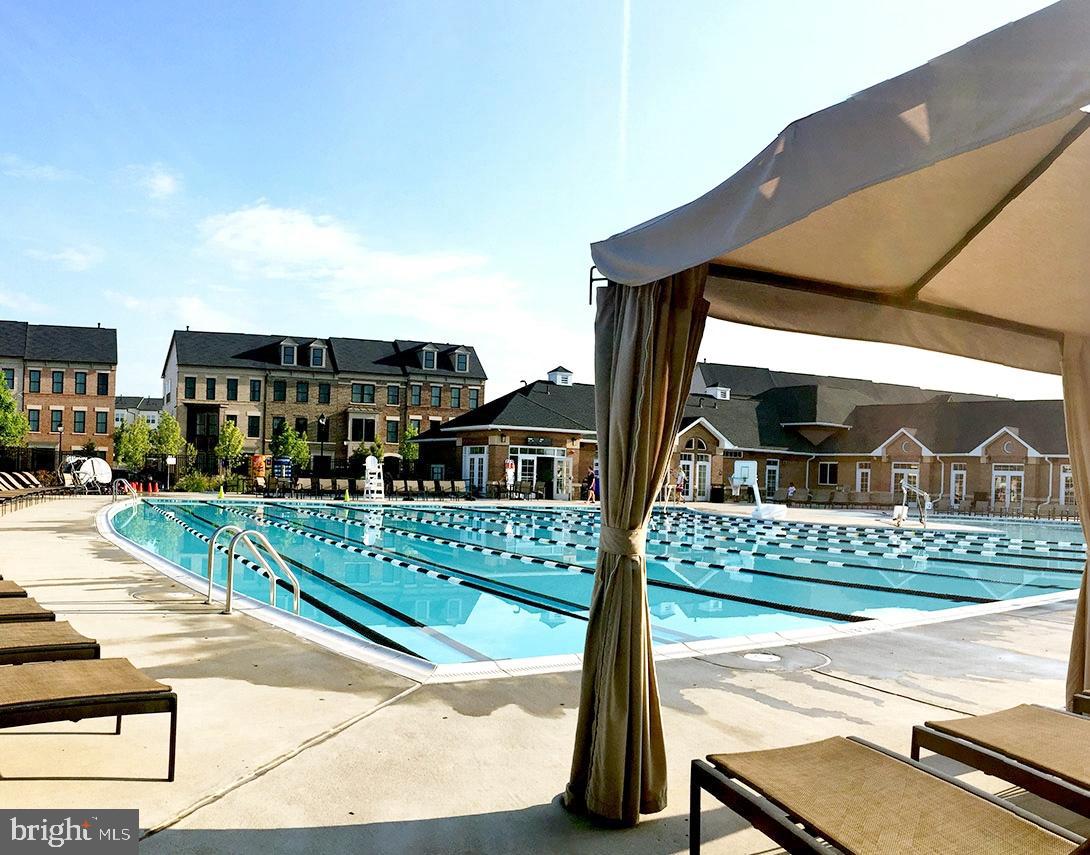 22954 Sullivans Cove Square Brambleton, VA 20148 - Photo 37 of 38 a view of houses with a street