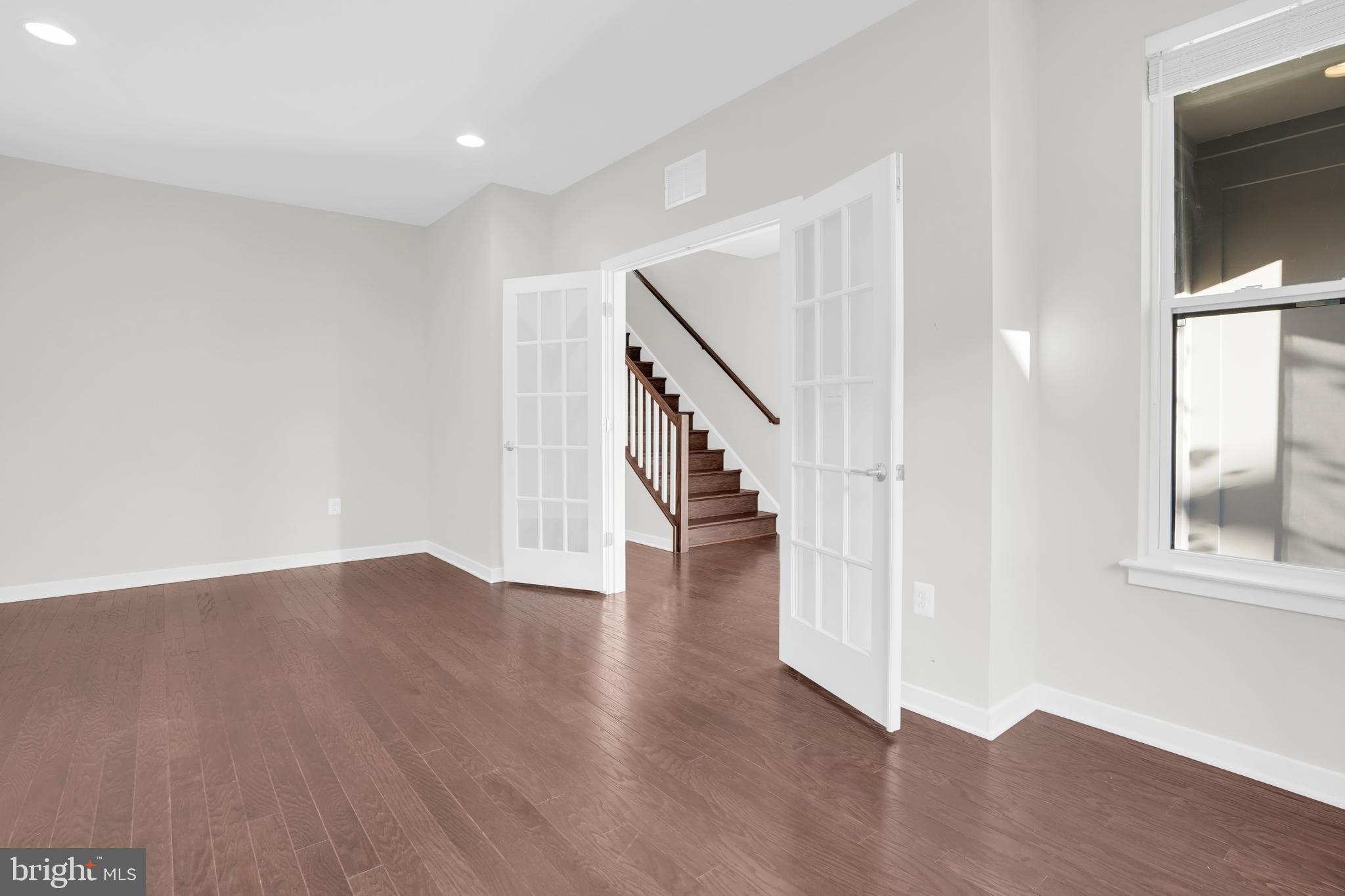 22954 Sullivans Cove Square Brambleton, VA 20148 - Photo 5 of 38 a view of an entryway with wooden floor