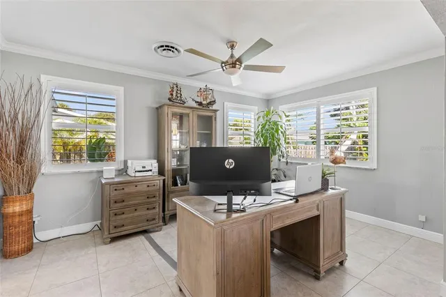 a view of a workspace with furniture