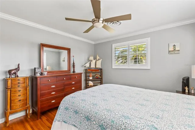 a living room with furniture and a gym equipment