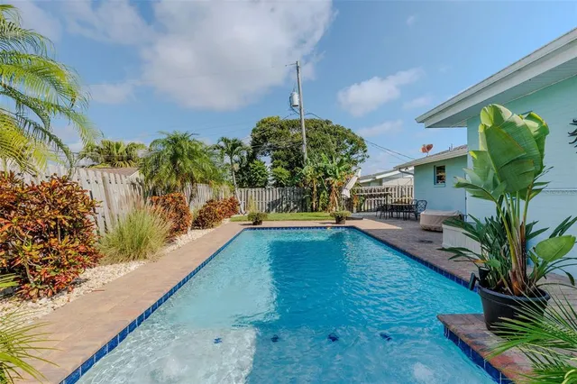 a outdoor living space with furniture and a potted plant