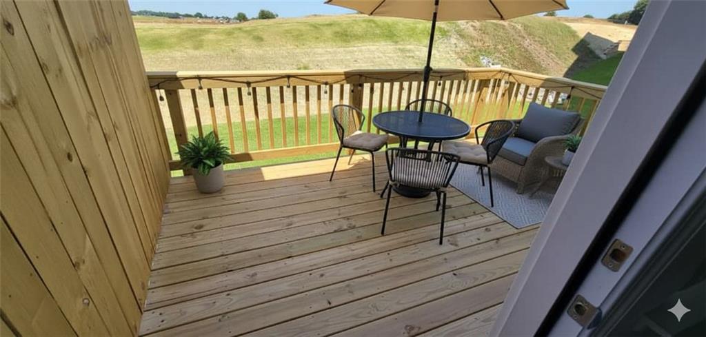 93 Wilder Ridge Way Lawrenceville, GA 30044 - Photo 5 of 8 a view of a balcony with furniture