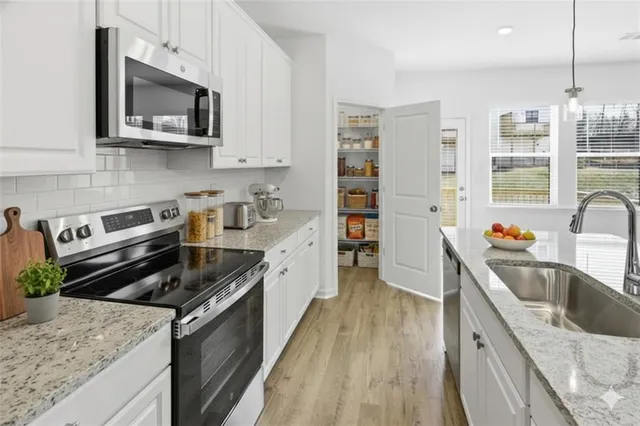 a close view of water heater on a shelf