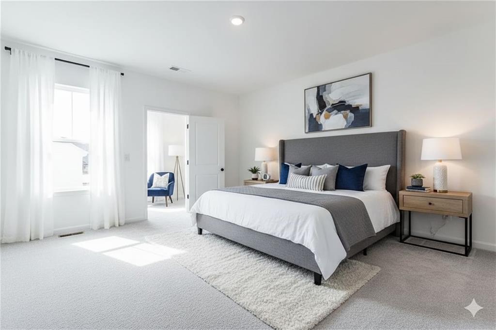 93 Wilder Ridge Way Lawrenceville, GA 30044 - Photo 6 of 8 a bedroom with a bed and a painting on the wall