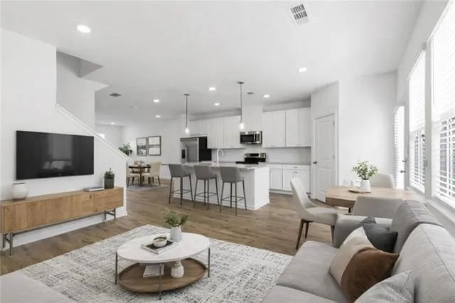 a bed room with a bed and a dresser