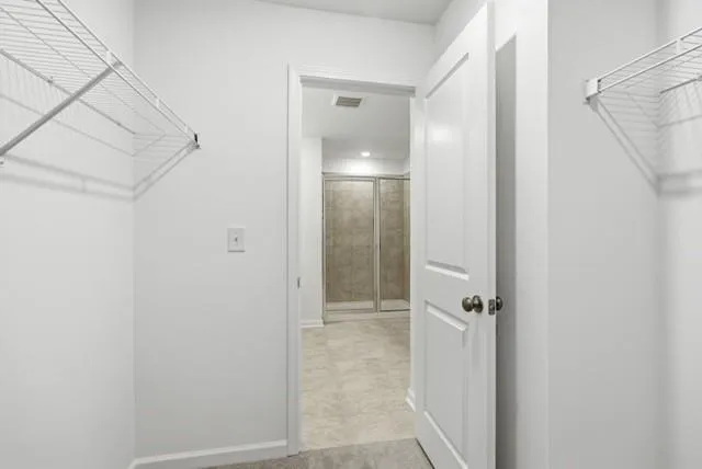 a view of a room with racks on the wall