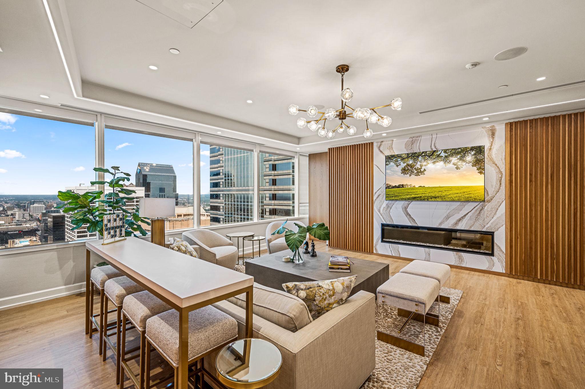 50 South 16th Street, Unit 5203 Philadelphia, PA 19103 - Photo 32 of 59 Amenities lounge with Fireplace