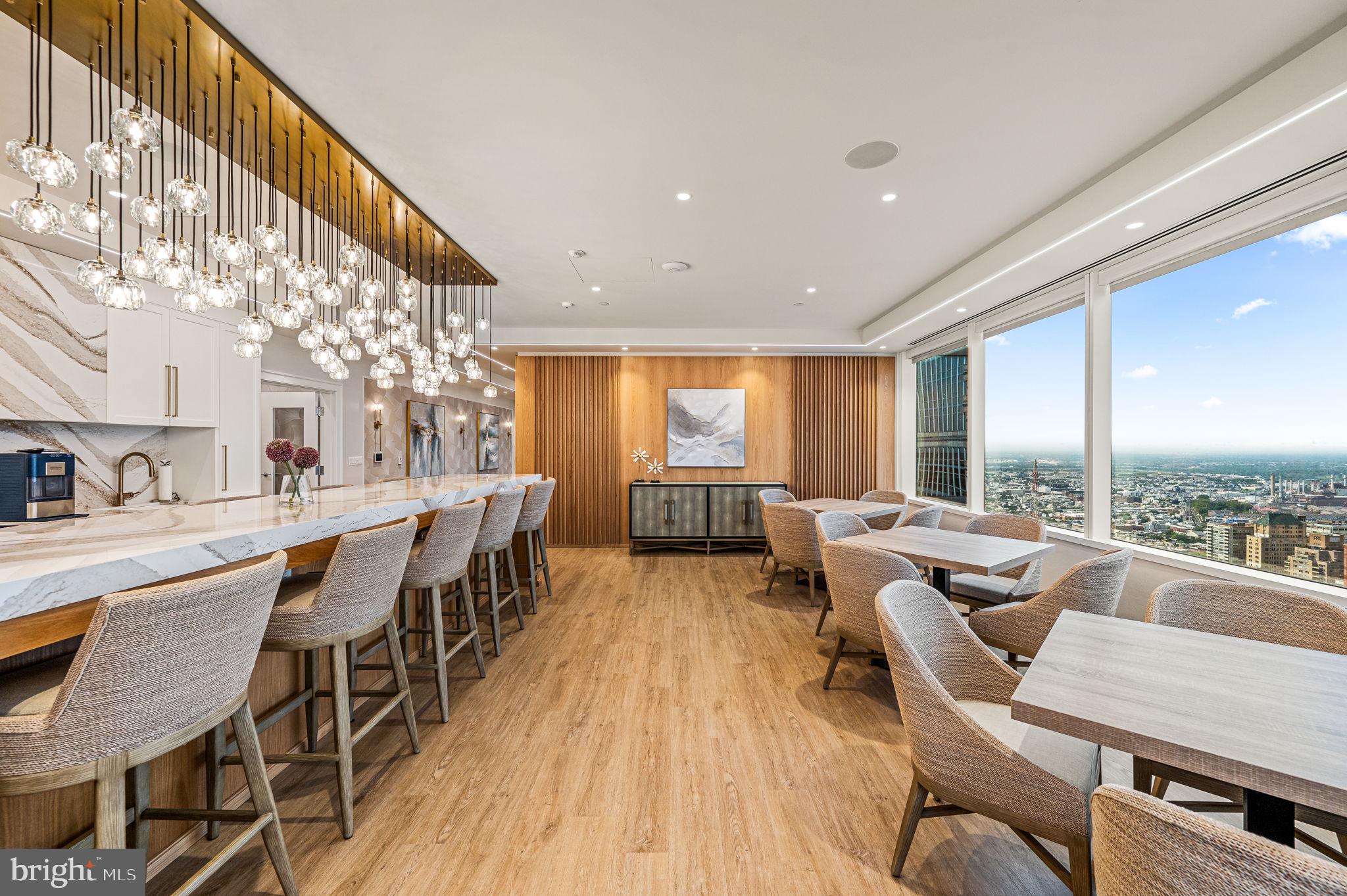 50 South 16th Street, Unit 5203 Philadelphia, PA 19103 - Photo 38 of 60 Amenities Kitchen and Dining Tables with views