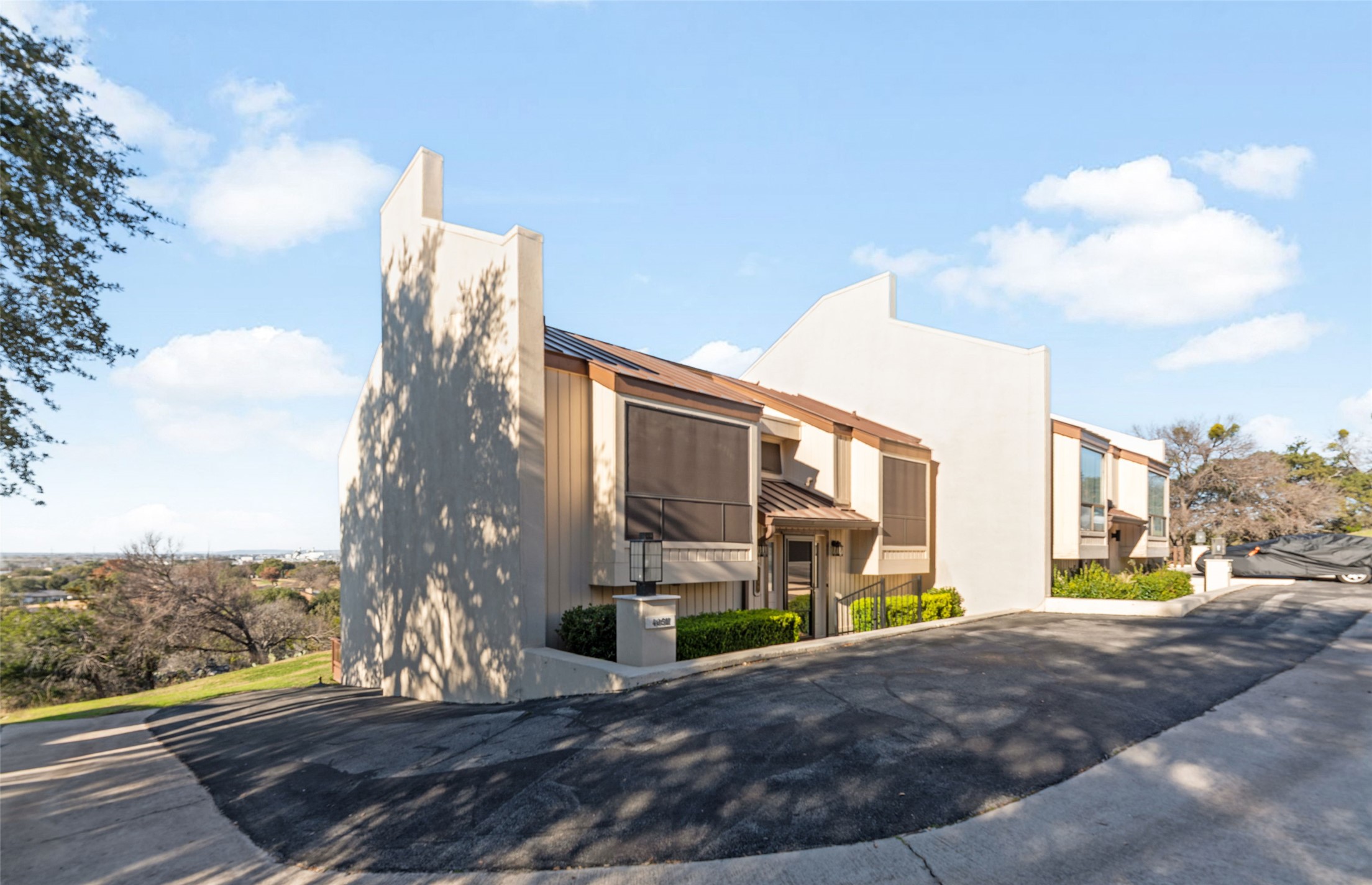 409 Hi There, Unit M Horseshoe Bay, TX 78657 - Photo 1 of 1 a view of a city with tall buildings