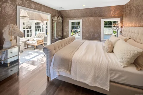 a living room with furniture and windows