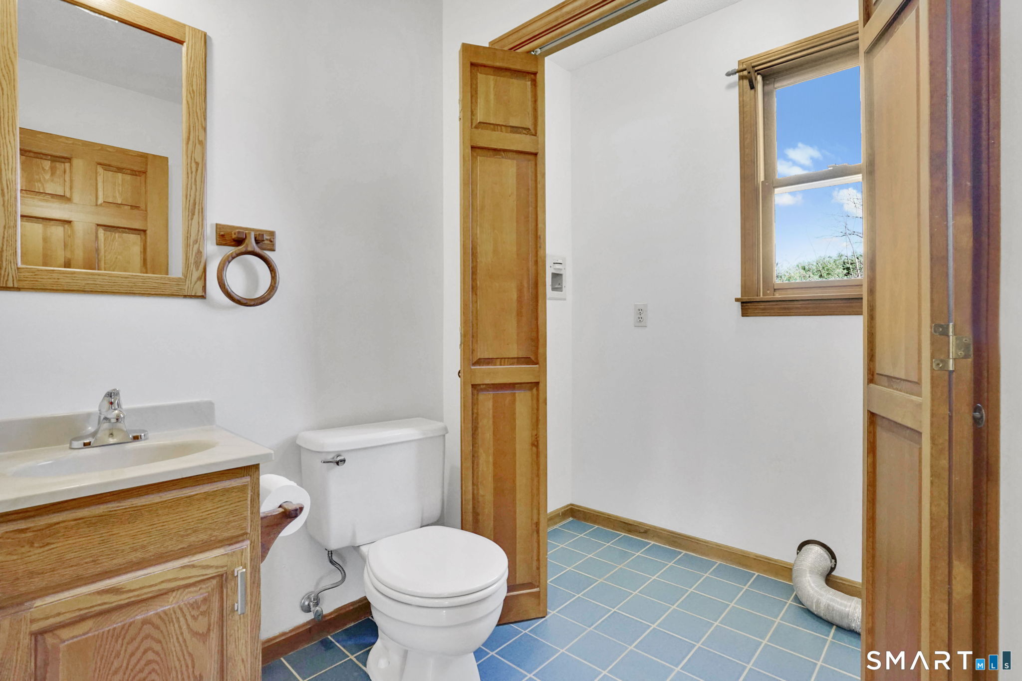 281 Turnpike Road Somers, CT 06071 - Photo 18 of 39 Half bath with laundry closet on 1st floor