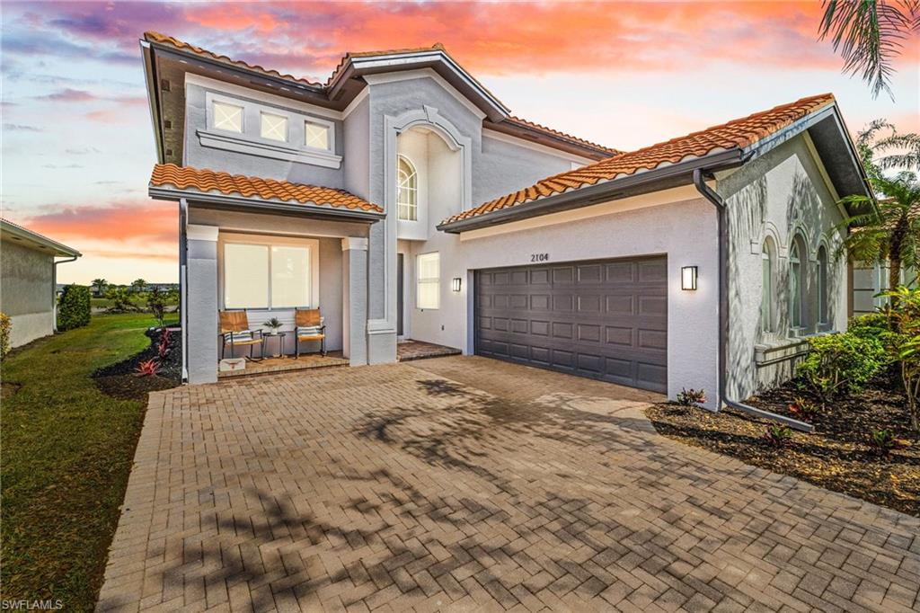 2104 Par Drive Naples, FL 34120 - Photo 1 of 37 a view of a house with a yard