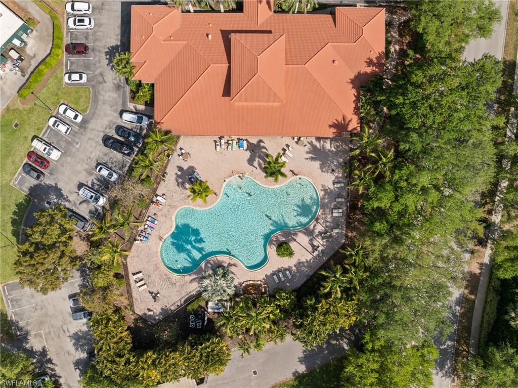 2104 Par Drive Naples, FL 34120 - Photo 30 of 37 an aerial view of a house with a swimming pool