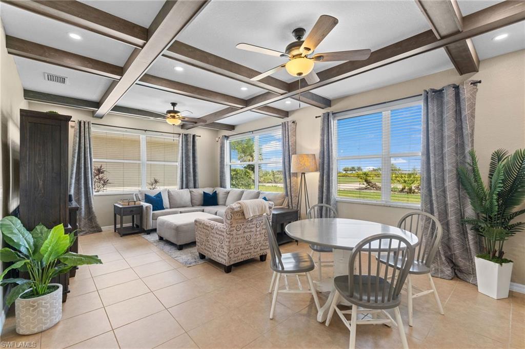 2104 Par Drive Naples, FL 34120 - Photo 3 of 37 a living room with furniture and a potted plant