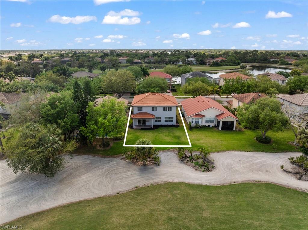 2104 Par Drive Naples, FL 34120 - Photo 31 of 37 an aerial view of a house