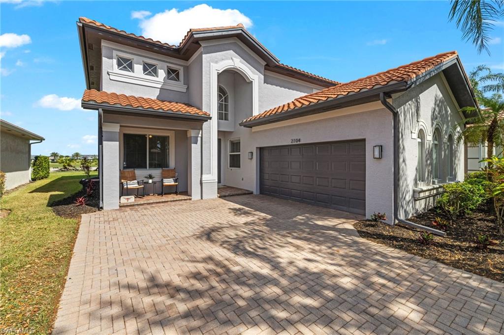 2104 Par Drive Naples, FL 34120 - Photo 34 of 37 a view of a house with a patio