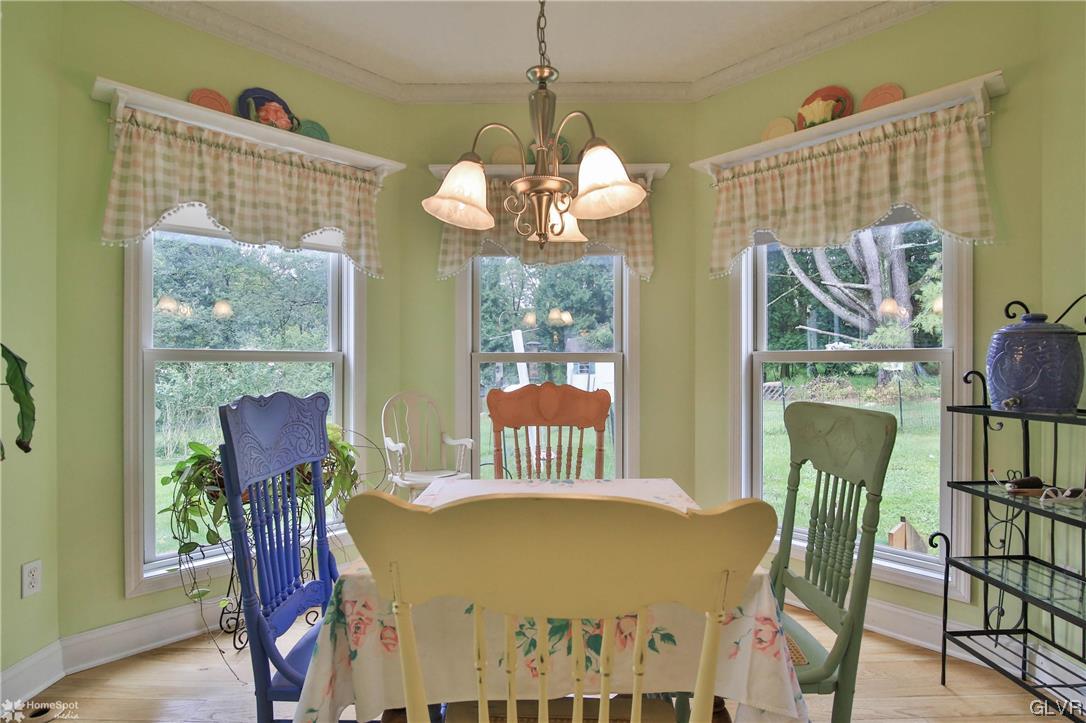 475 English Road Bath, PA 18014 - Photo 13 of 46 a view of a dining room with furniture and chandelier