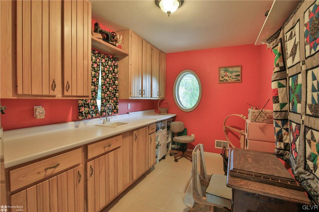 475 English Road Bath, PA 18014 - Photo 20 of 46 a kitchen with a sink cabinets and a window