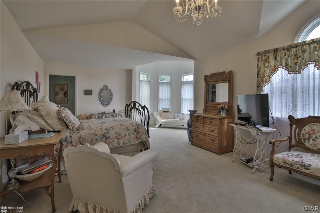 475 English Road Bath, PA 18014 - Photo 21 of 46 a living room with furniture and a chandelier