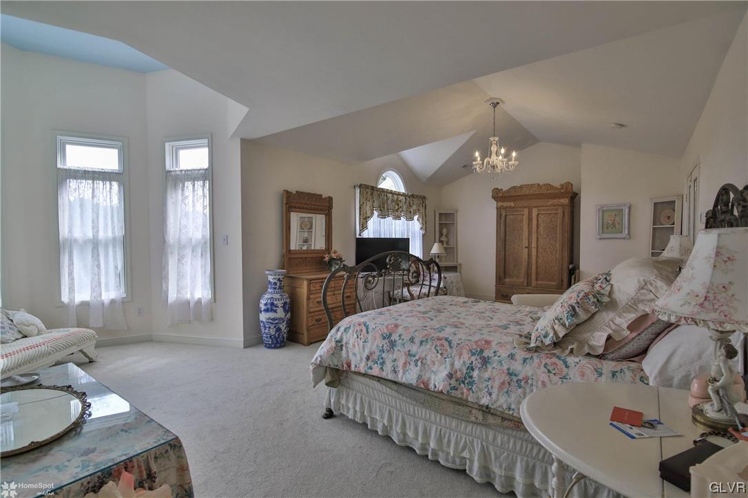 475 English Road Bath, PA 18014 - Photo 22 of 46 a bedroom with a bed and wooden floor