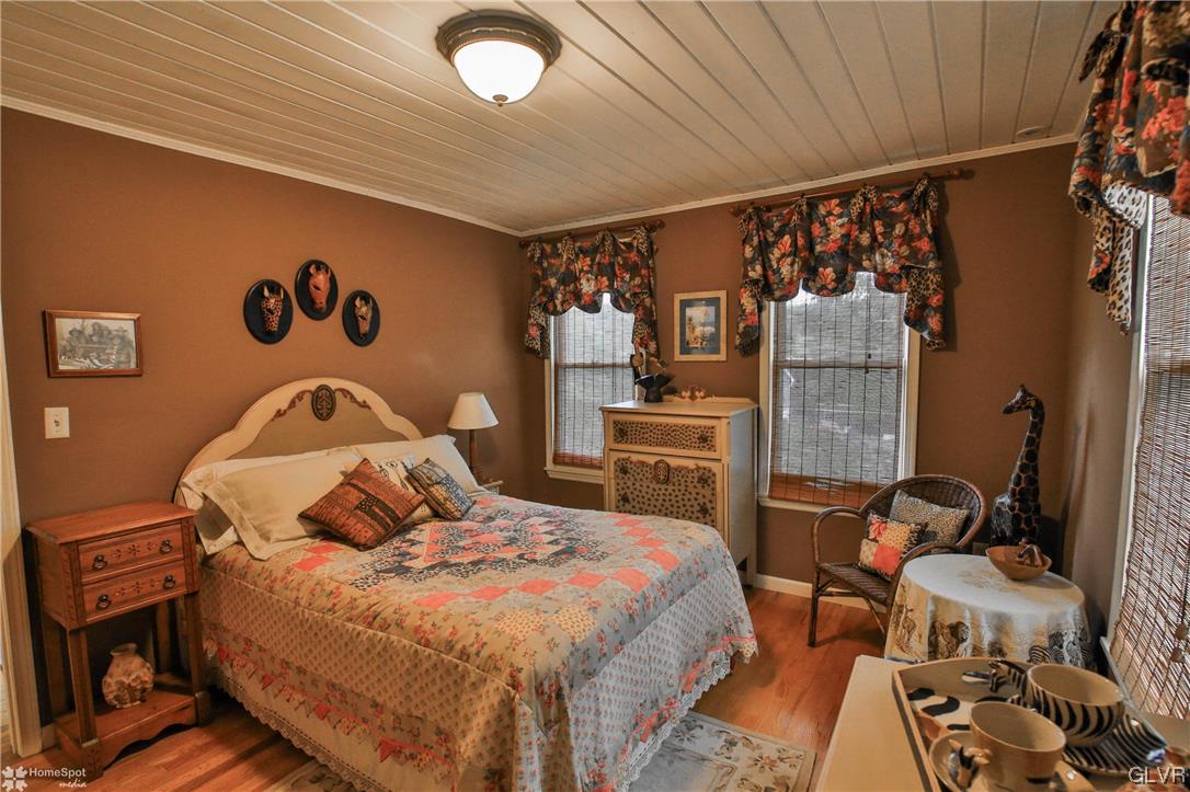 475 English Road Bath, PA 18014 - Photo 27 of 46 a bedroom with a bed and a table