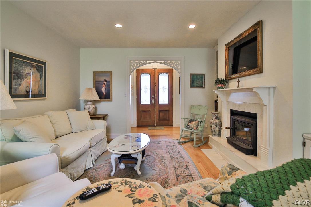 475 English Road Bath, PA 18014 - Photo 6 of 46 a living room with furniture fireplace and a flat screen tv