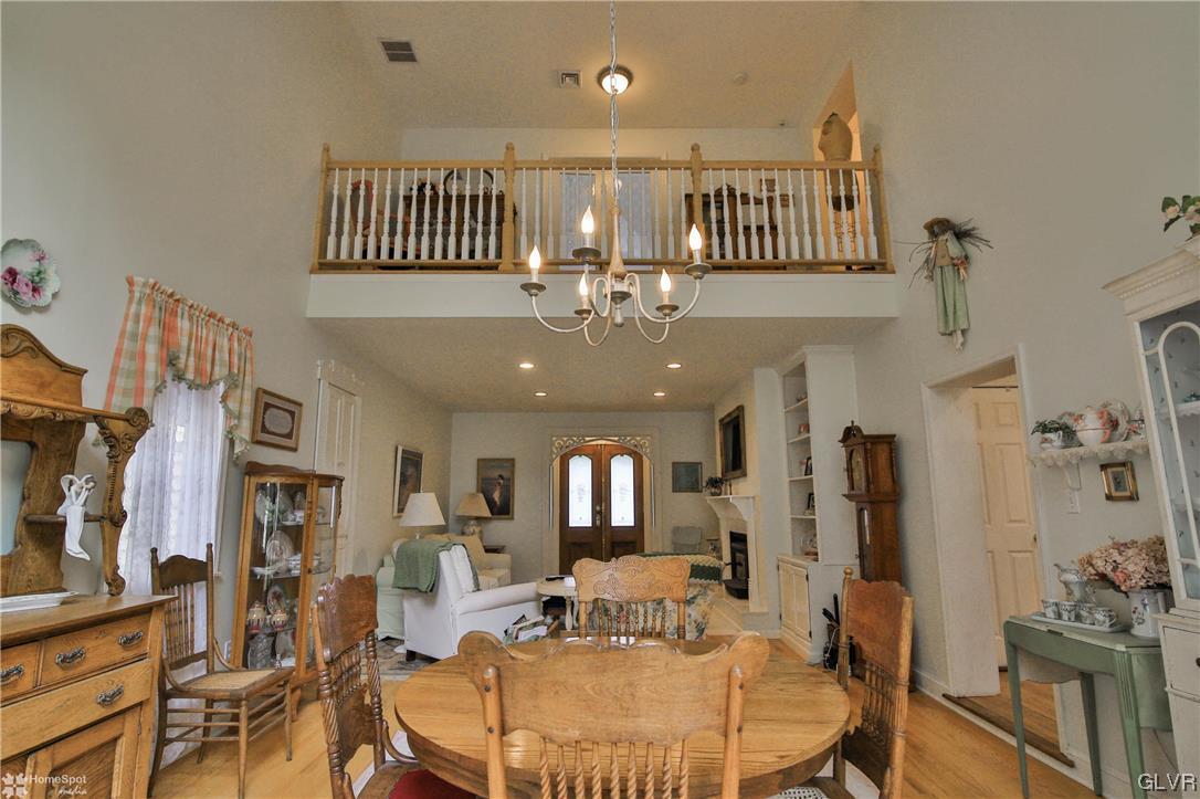 475 English Road Bath, PA 18014 - Photo 9 of 46 a view of a livingroom with furniture and chandelier