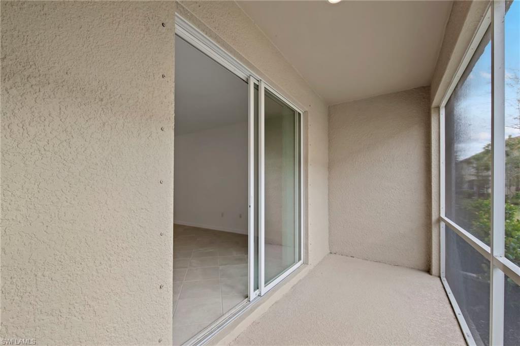 2827 Blossom Way Naples, FL 34120 - Photo 20 of 34 View of unfurnished sunroom
