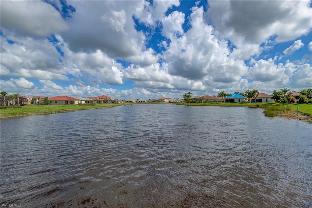 2827 Blossom Way Naples, FL 34120 - Photo 29 of 34 Water view featuring nearby suburban area