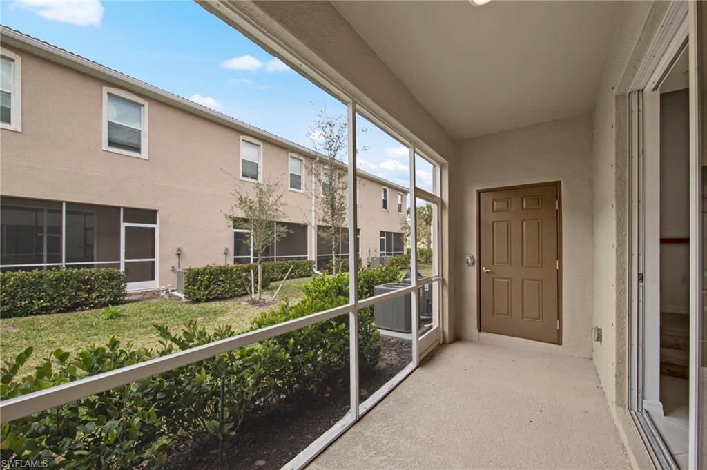 2827 Blossom Way Naples, FL 34120 - Photo 32 of 34 View of unfurnished sunroom