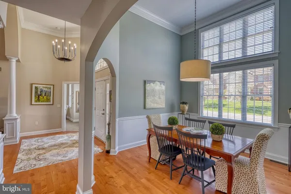 a view of hall way with furniture