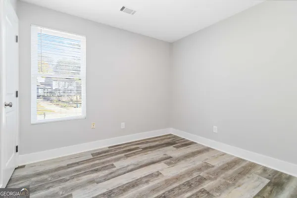 a view of a room with a window