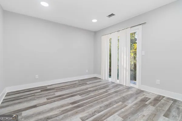 a view of a room with an empty space