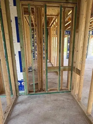 a view of a room with wooden walls