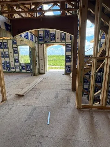 a view of livingroom with an empty room