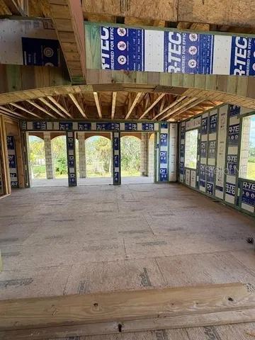 an empty room with glass door