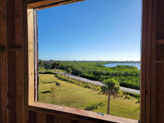 a view of a lake from a window